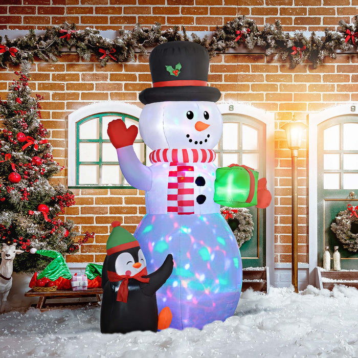 Outsunny 8FT Christmas Inflatable Snowman Holding Gift Box with Penguin, Christmas Blow Up Snowman with Rotating Colorful LED Light for Indoor, Outdoor, Party | Aosom UK