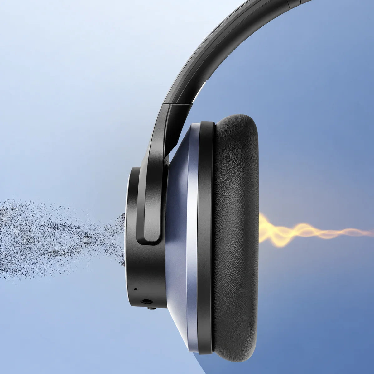 Original earcup illustration showing the external microphone port and padded interior, with noise outside and a sound wave inside
