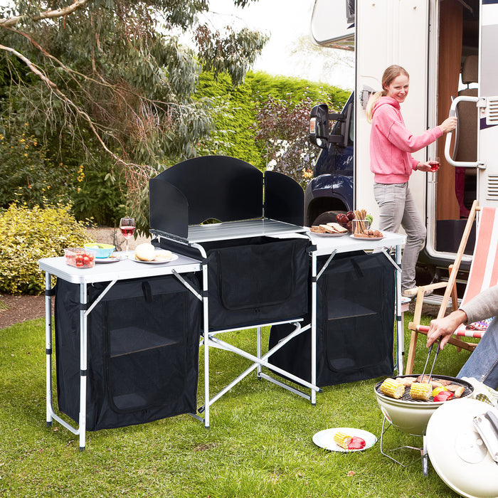 Portable Camping Cooking Workstation - Foldable Outdoor Kitchen Table with Windscreen and Storage - Ideal for BBQ, Parties, and Picnics