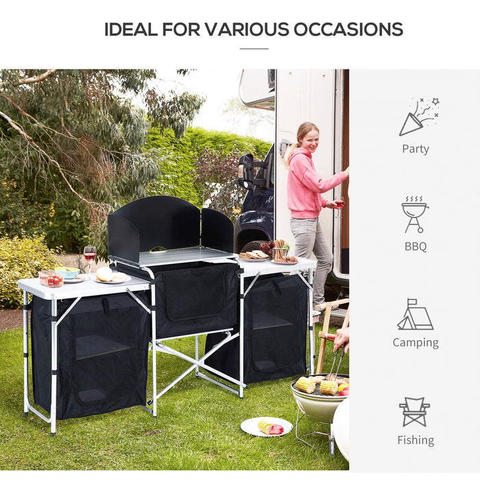 Portable Camping Cooking Workstation - Foldable Outdoor Kitchen Table with Windscreen and Storage - Ideal for BBQ, Parties, and Picnics