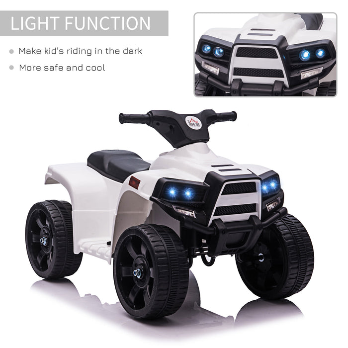 Electric ATV Toy Quad for Toddlers - 6V Battery Powered Kids Ride-On with Headlights, White & Black - Fun Outdoor Play for Children Aged 18-36 Months