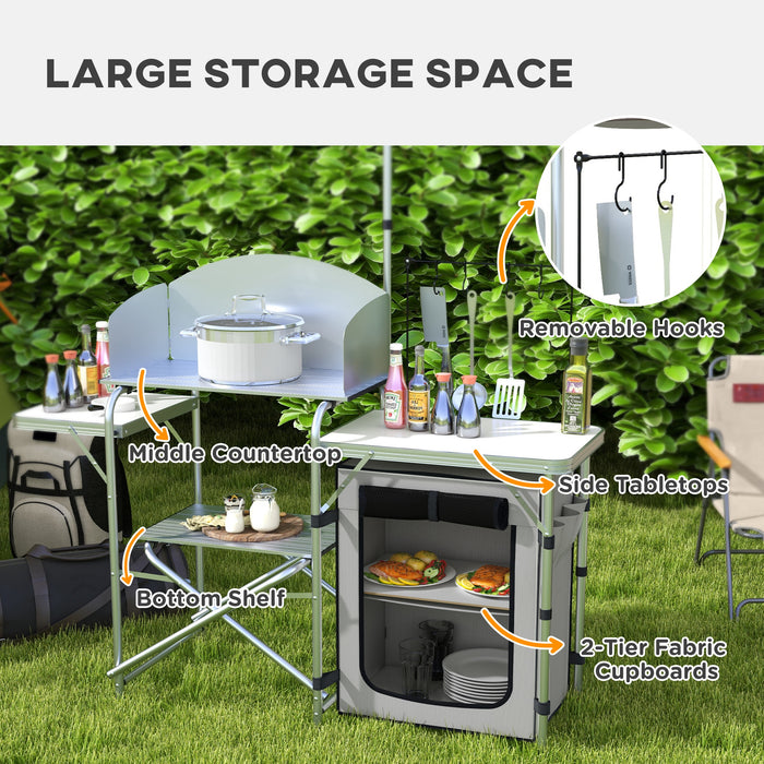 Folding Camping Kitchen Station with Storage - Aluminum Picnic Table with Windshield & Light Stand - Portable BBQ Setup with Carry Bag for Outdoor Enthusiasts